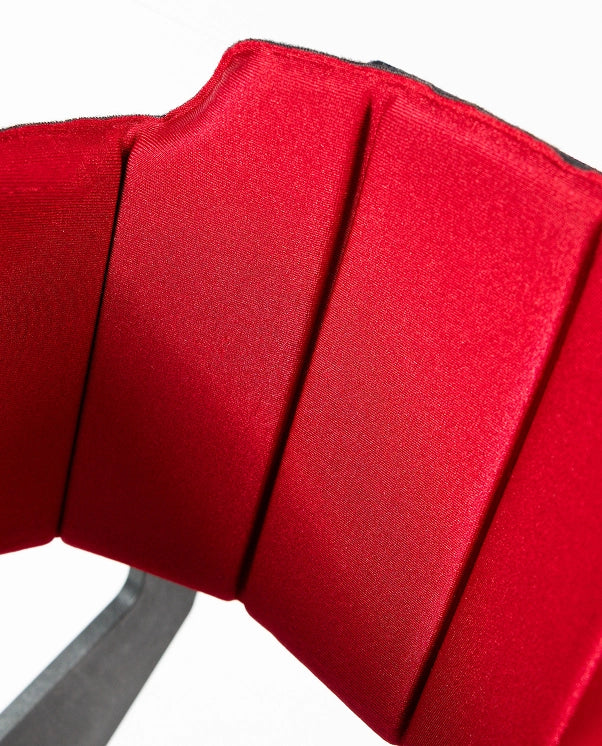 Close-up of a red fabric on a white background