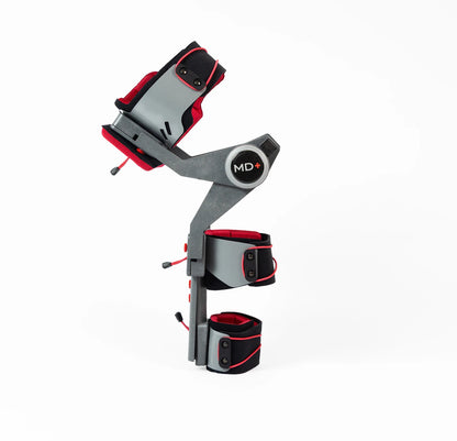 Gray and red leg exercise device with 'MD+' branding on a white background