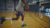 An image of a man playing basketball with uppercase 'Pain' word above