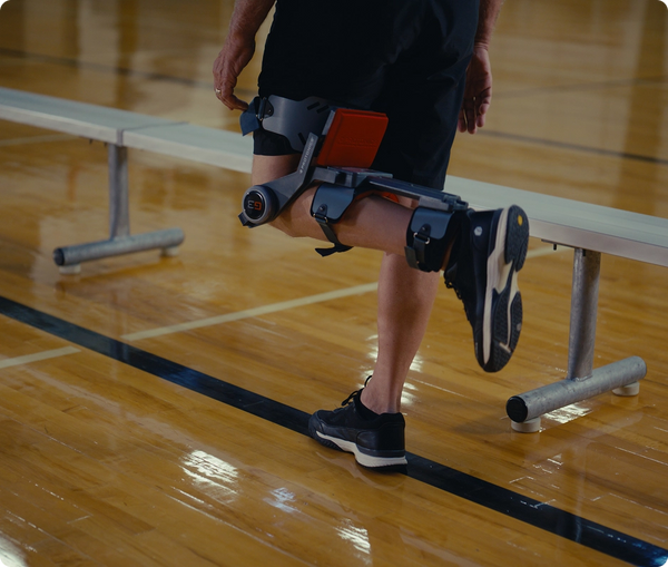 Person using a G3 device on a gym floor