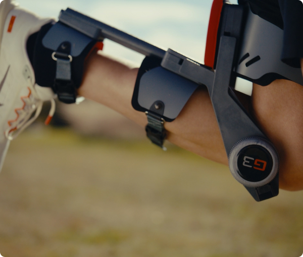 Close-up of a person wearing a G3 device with a blurred background.